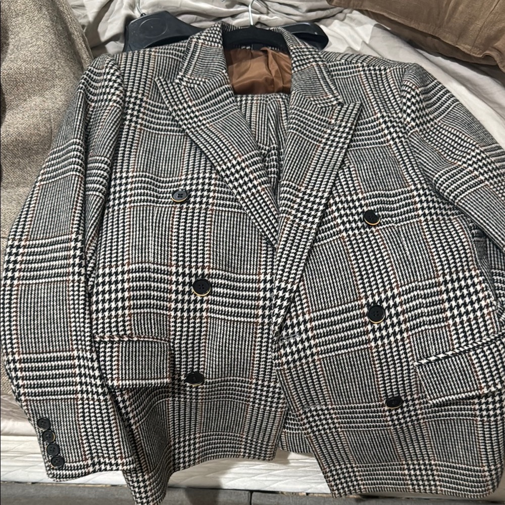 Men's Black, White, and brown checkered wool suit.